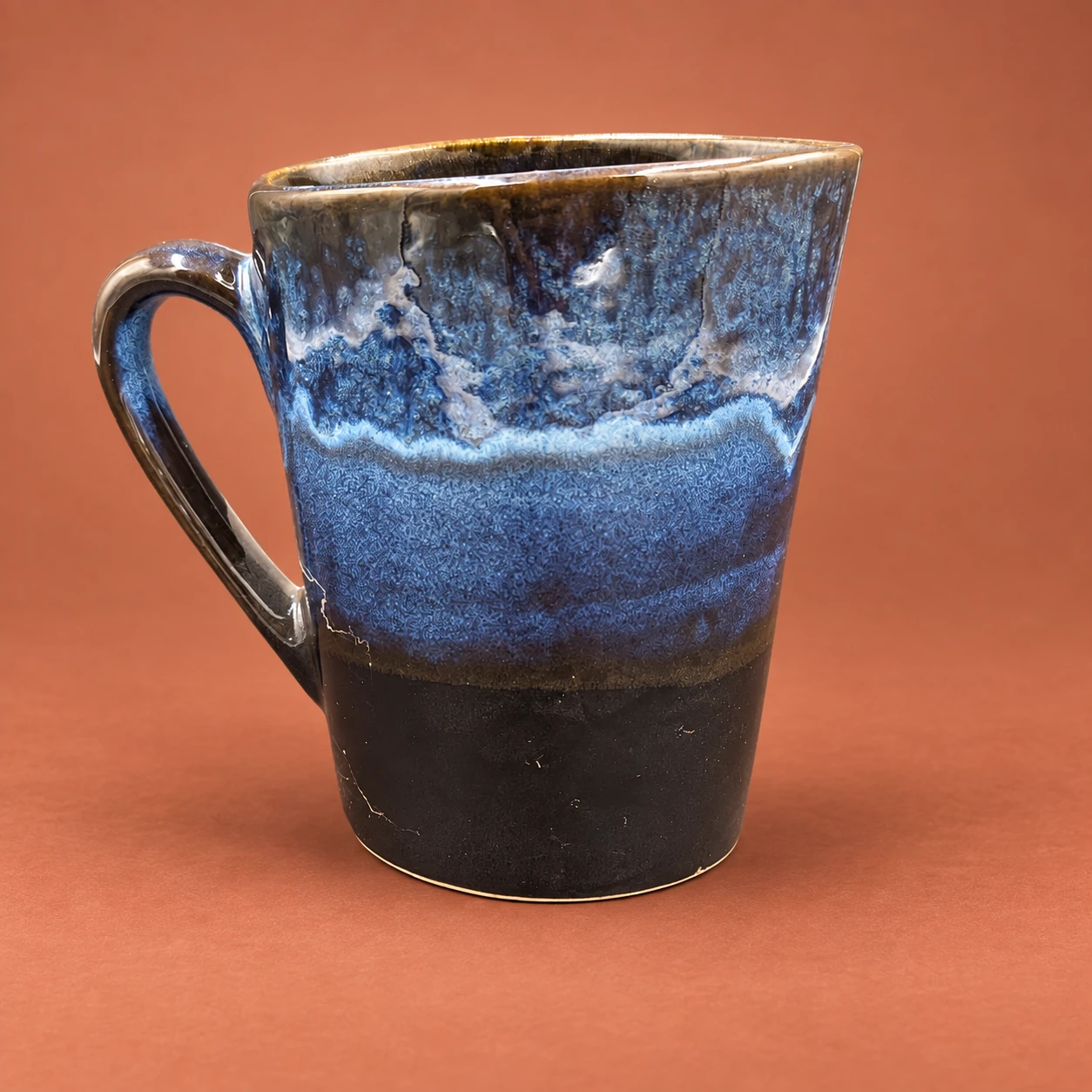 Taza alta · azul y negro