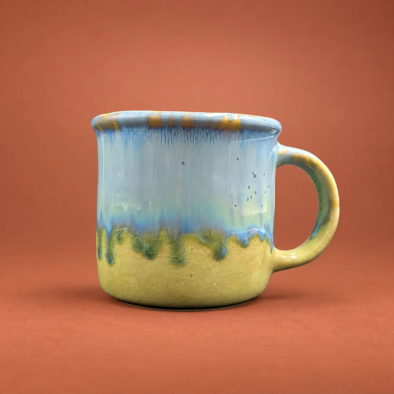 Taza · azul y amarillo